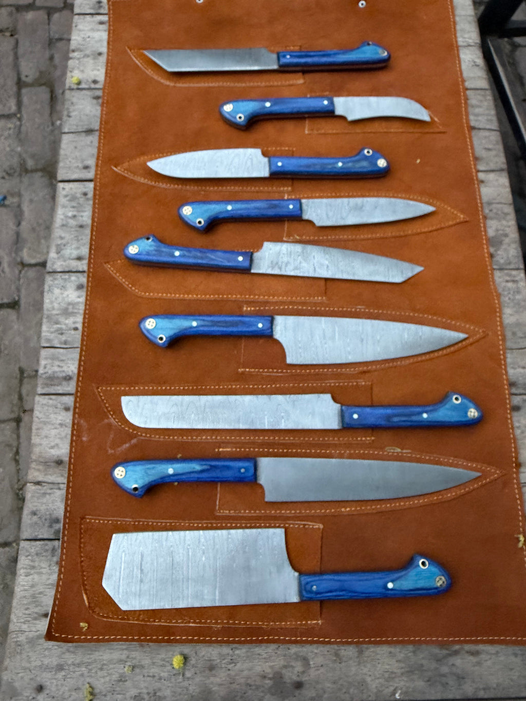 9-Piece Damascus Kitchen Knife Set with Leather Roll and Blue Pakka Wood Handles