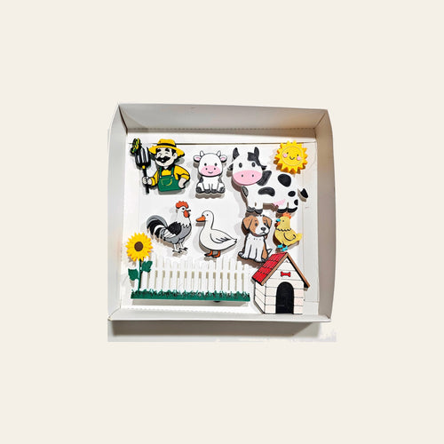 3D Hobby Farmer Cow Farm Animal Magnet Gift Set Made in America on a warm cream background