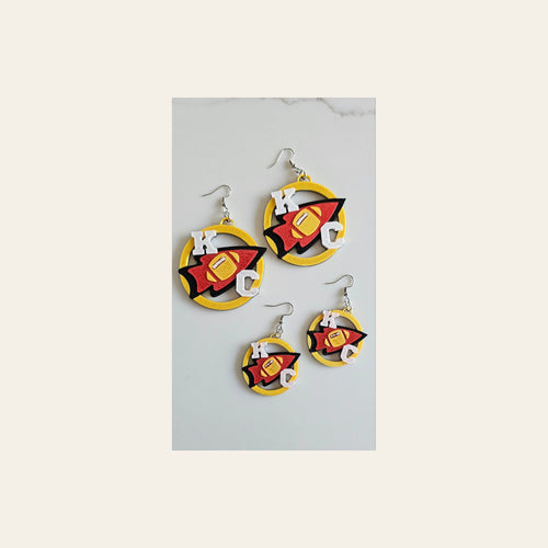 3D Print Chiefs Earrings Keychain Red Kingdom Kansas City KC Football on a warm cream background