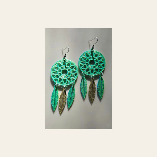 3D Print Dreamcatcher Boho Earrings Made in America on a warm cream background