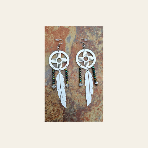 3D print Lightweight New Mexico Zia Feather Dream Catcher Earrings Made in America on a warm cream background