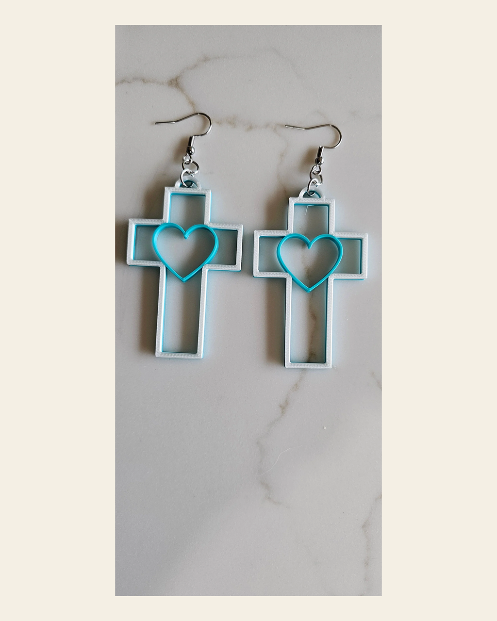 3D Print Christian Cross Faith Earrings Made in America on a warm cream background
