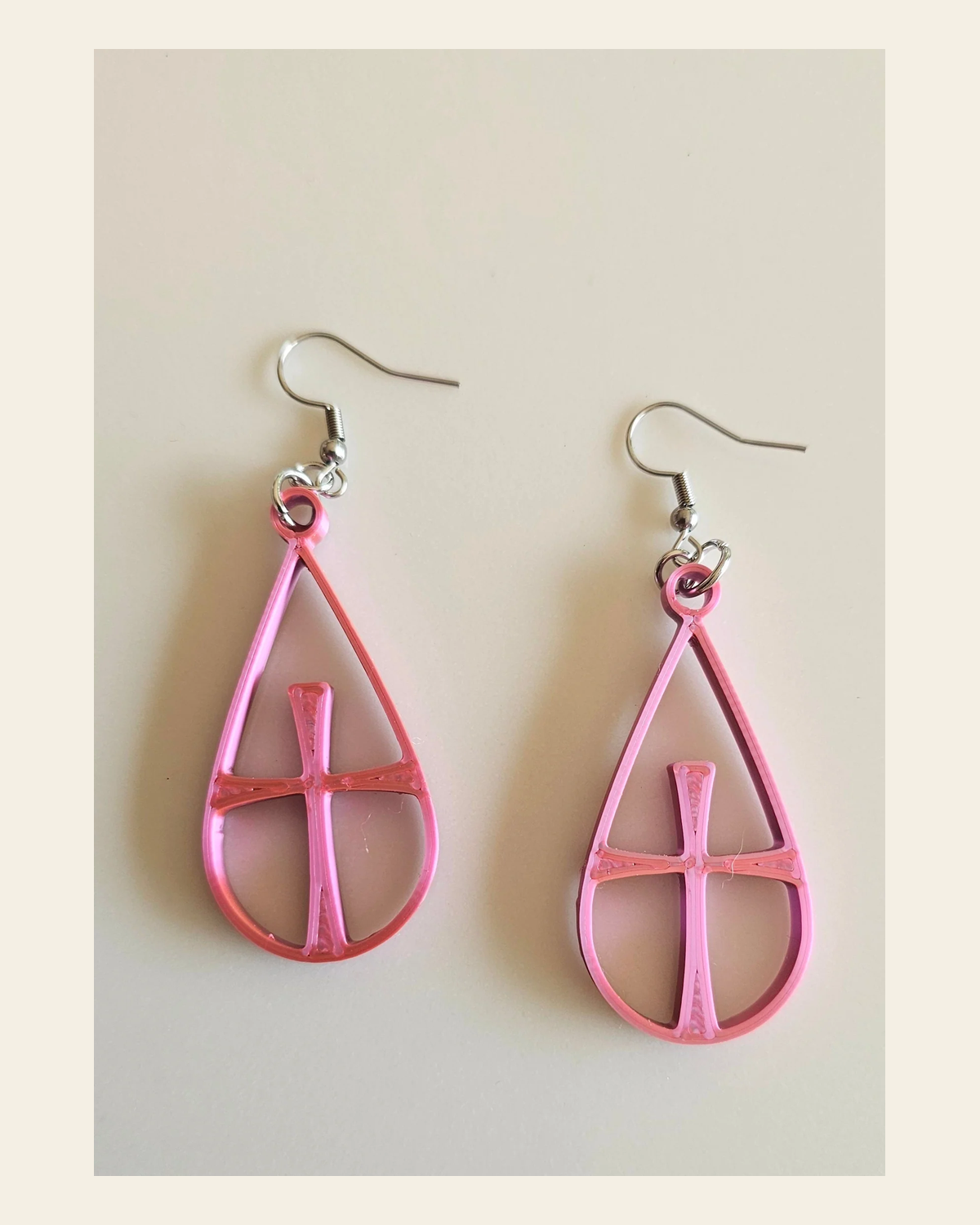 3D Print Christian Cross Faith Earrings Made in America on a warm cream background