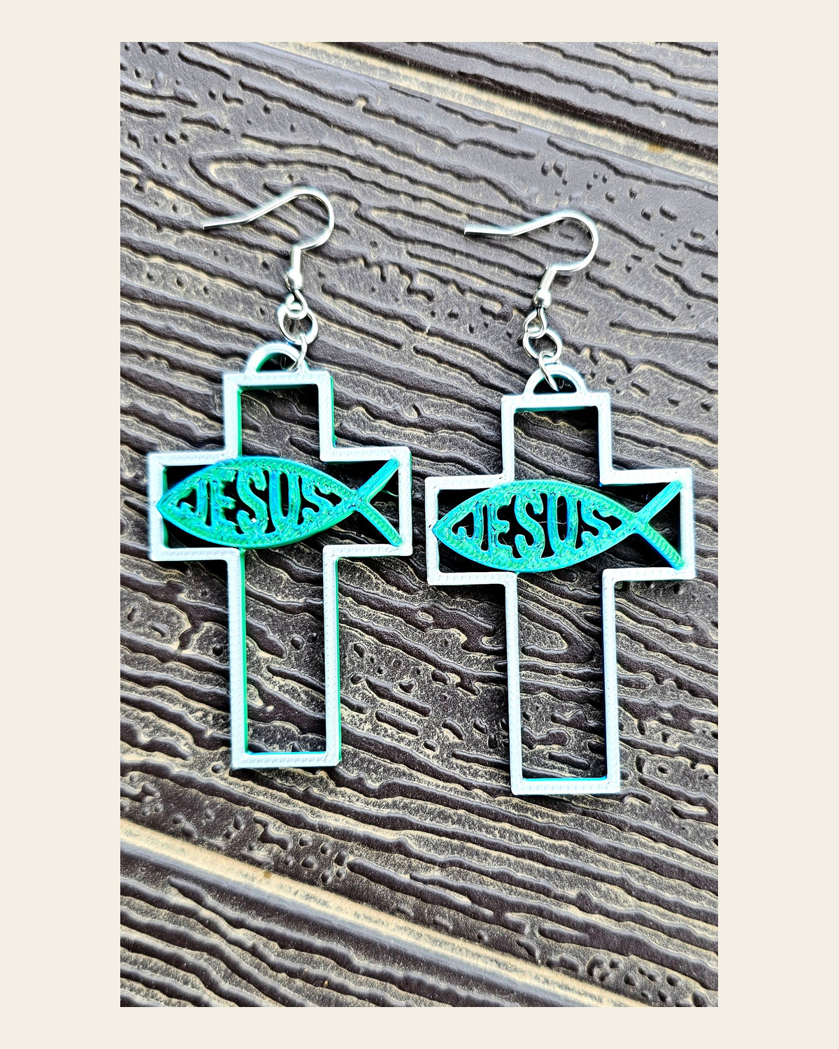 3D Print Christian Cross Faith Earrings Made in America on a warm cream background