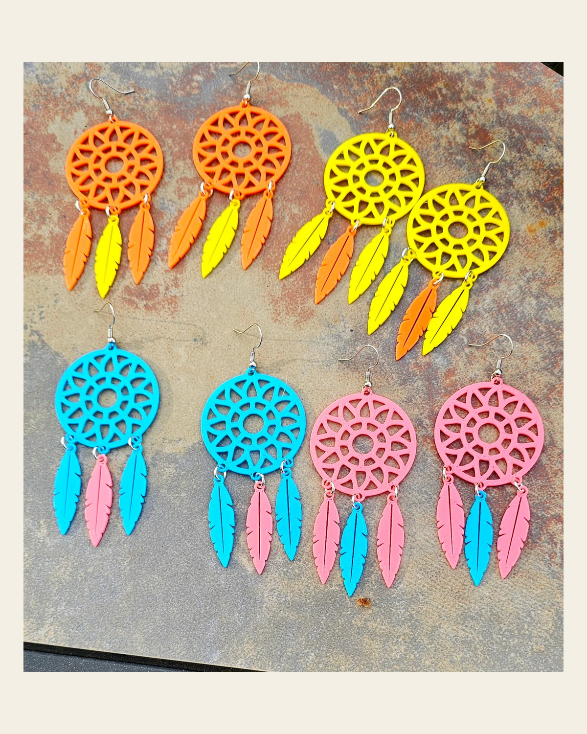 3D Print Dreamcatcher Boho Earrings Choice of Colors Made in America on a warm cream background