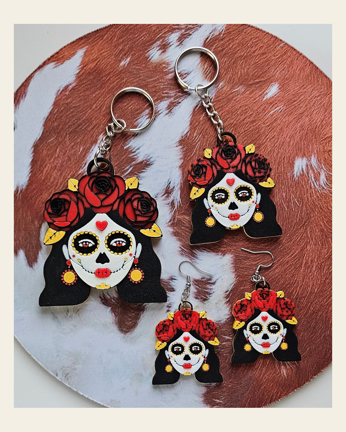 3D Print Mexico Theme Día de los Muertos Day of The Dead Sugar Skull Keychain or Earrings on a warm cream background