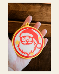 3d Print Santa Claus Christmas Ornament on a warm cream background