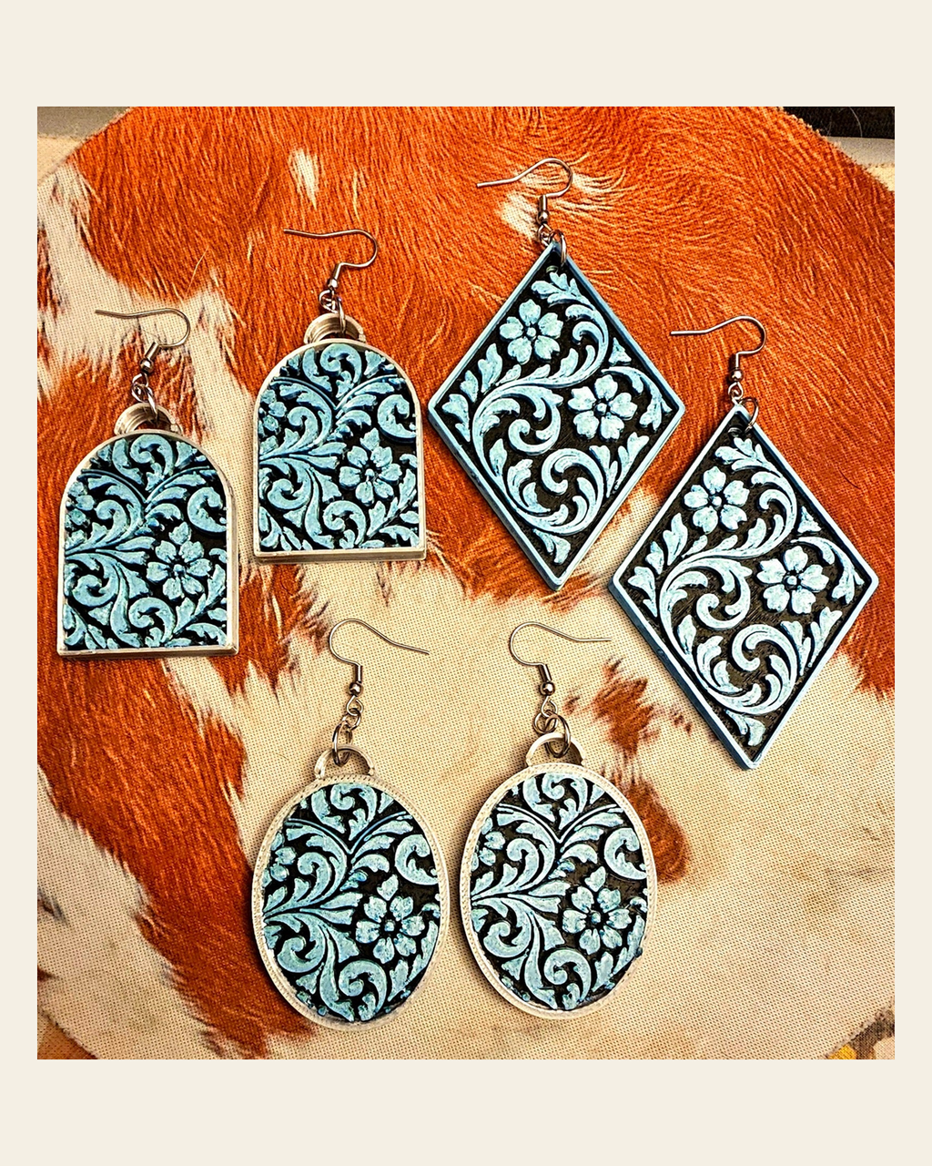 3D Print Western Tooled Turquoise  Earrings Made in America on a warm cream background