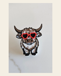 3d Printed Cool Highland Cow Hat Pin Made in America on a warm cream background