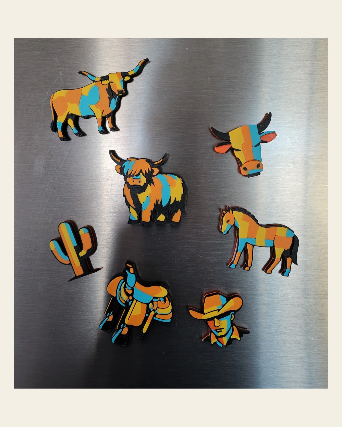 3d Printed Farm Western Longorn Horse Cow Magnet Made in America on a warm cream background