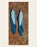 3D Printed Feather Leather Fringe Earrings Made in America on a warm cream background