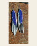 3D Printed Feather Leather Fringe Earrings Made in America on a warm cream background