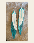 3D Printed Feather Leather Fringe Earrings Made in America on a warm cream background