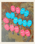 3D Printed Word Salad Earrings on a warm cream background