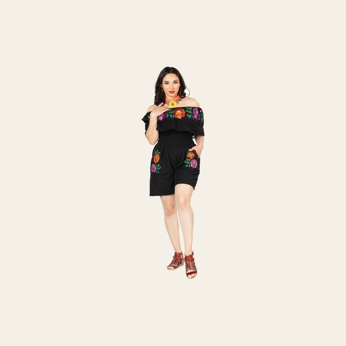 Artisanal Embroidered Romper 100% Cotton Black 603190 on a warm cream background