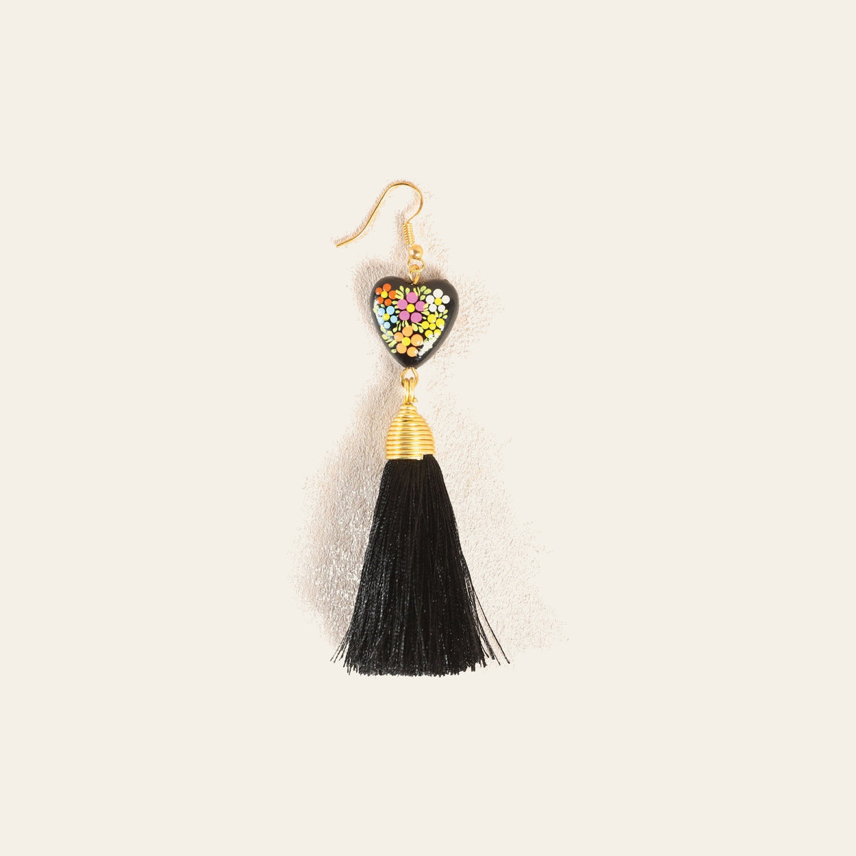 Artisanal Hand Painted Earrings Black 602165 on a warm cream background