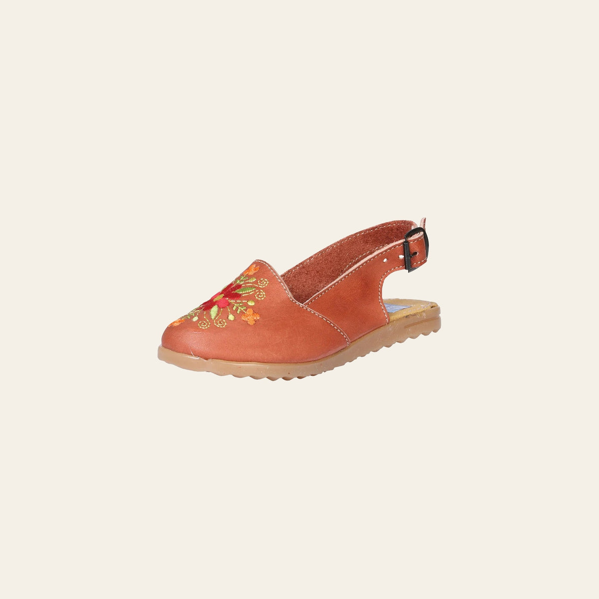 Artisanal Mexican Sandals Leather Natural 602372 on a warm cream background