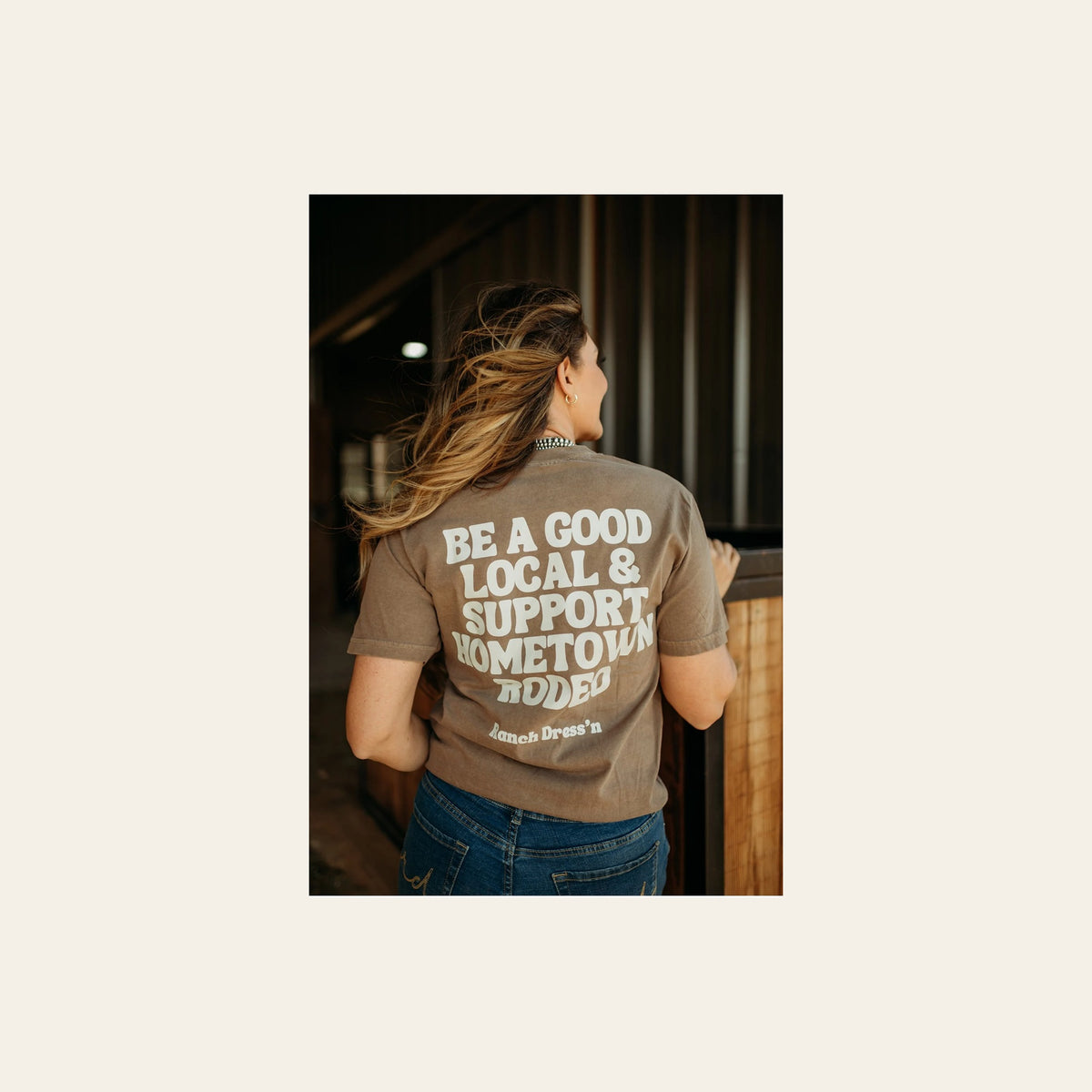 Be A Good Local And Support Hometown Rodeo Tee on a warm cream background