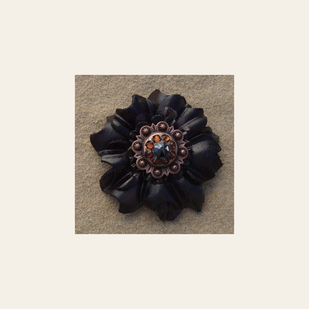 Black Carnation Flower With Copper Jet & Topaz 1" Concho on a warm cream background