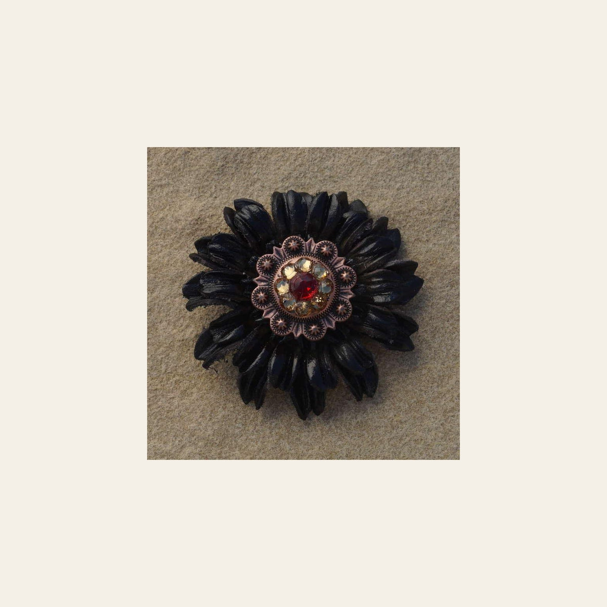 Black Daisy Flower With Copper Ruby and Champagne 1" Concho on a warm cream background