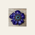 Blue Carnation Flower With Copper Amethyst & Aqua 1" Concho on a warm cream background