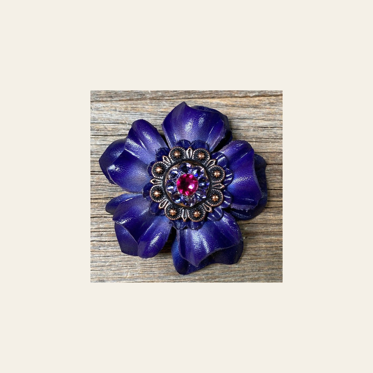 Blue Carnation Flower With Copper Fuchsia & Lilac 1" Concho on a warm cream background