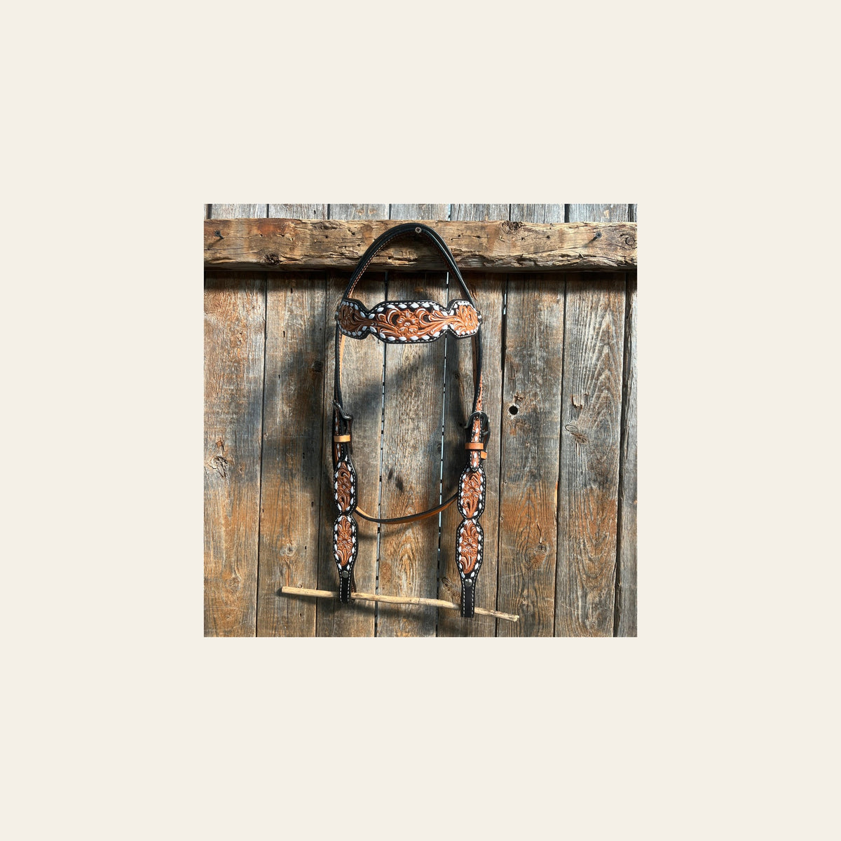Floral Tooled Buckstitch Browband Headstall / Bridle on a warm cream background