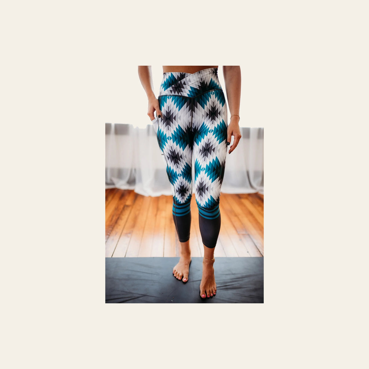 Brayden Crossover Leggings on a warm cream background