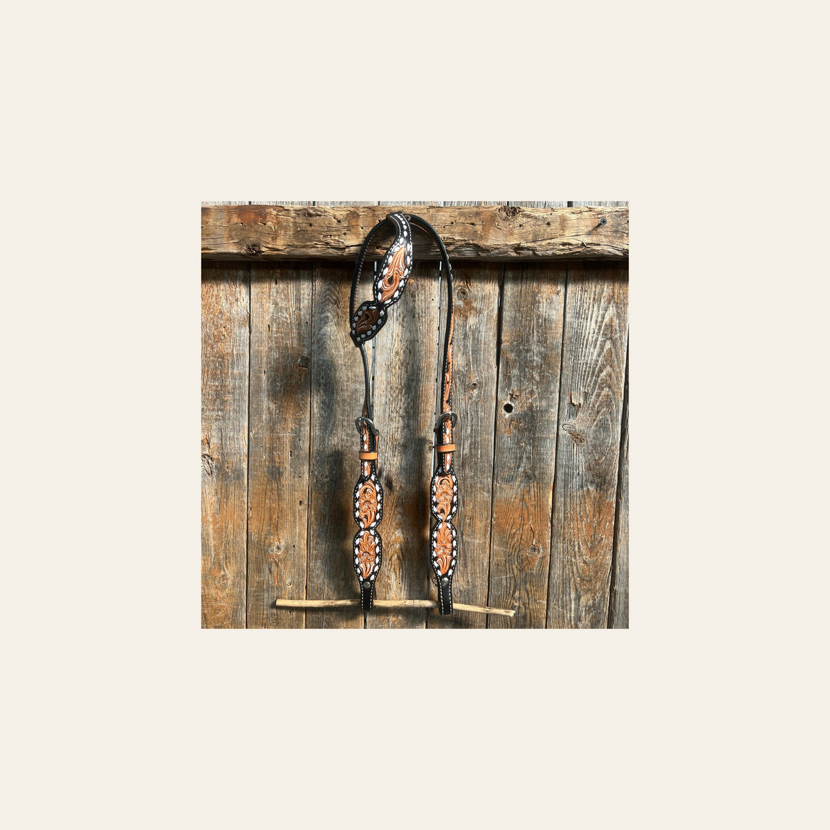 Floral Tooled Buckstitch One Ear Headstall / Bridle on a warm cream background