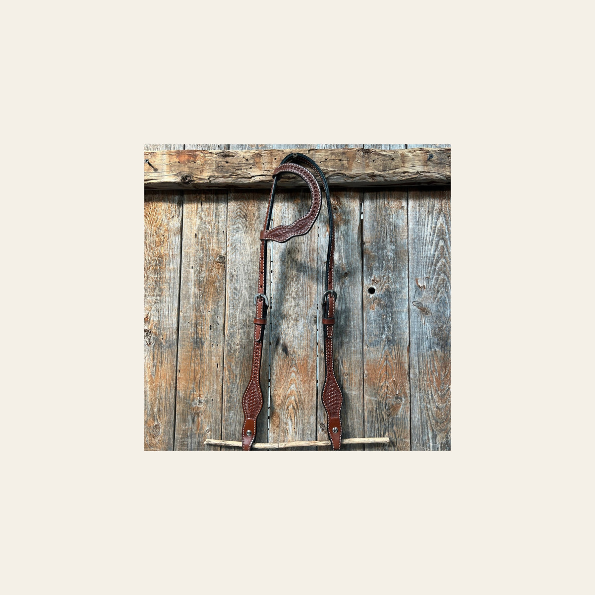 Basketweave Medium Oil One Ear Headstall / Bridle on a warm cream background