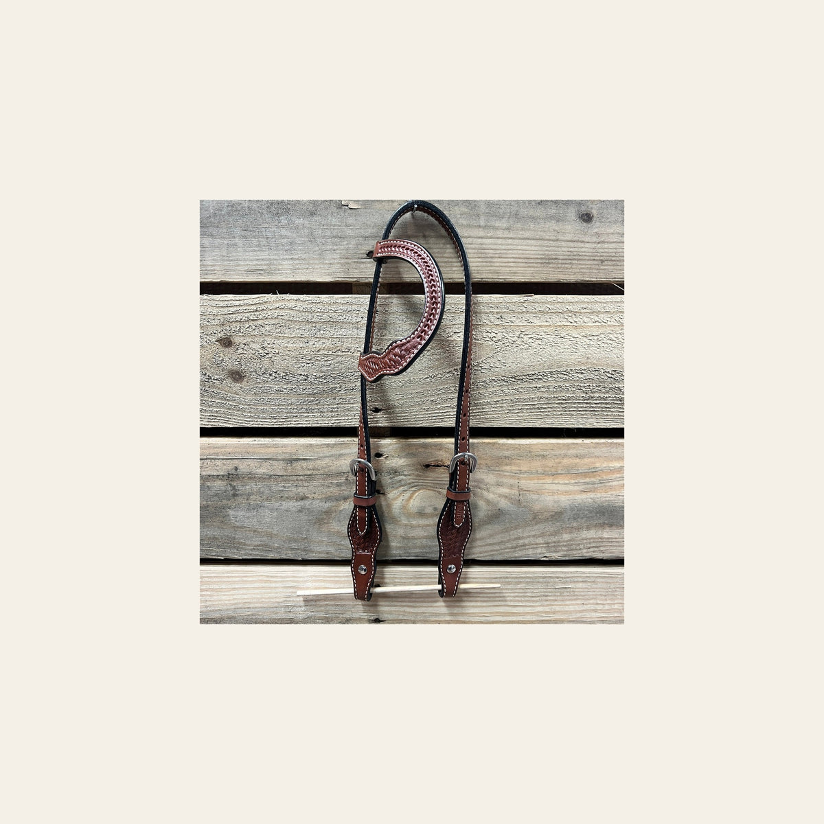 Medium Oil Cob - Gag One Ear Headstall / Bridle- Short Cheeks on a warm cream background