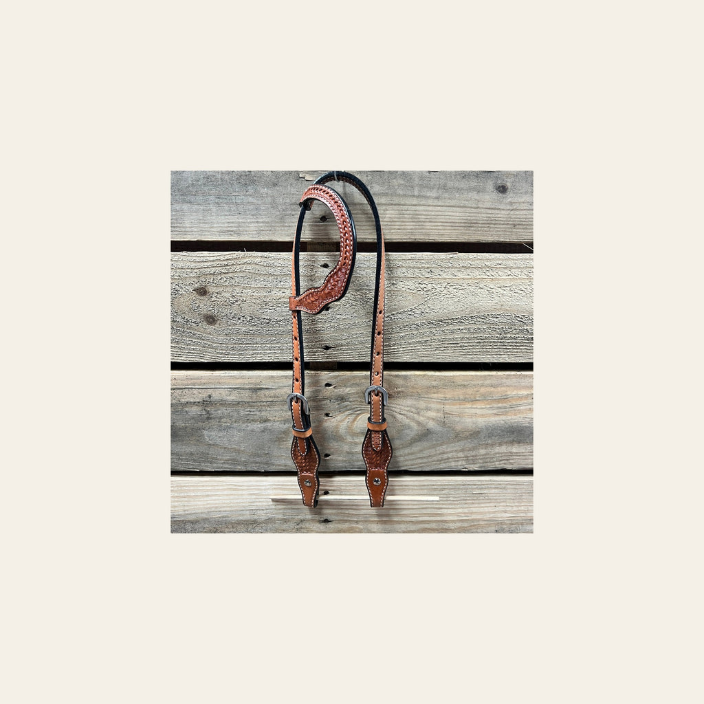 Light Oil Cob - Gag One Ear Headstall / Bridle- Short Cheeks on a warm cream background