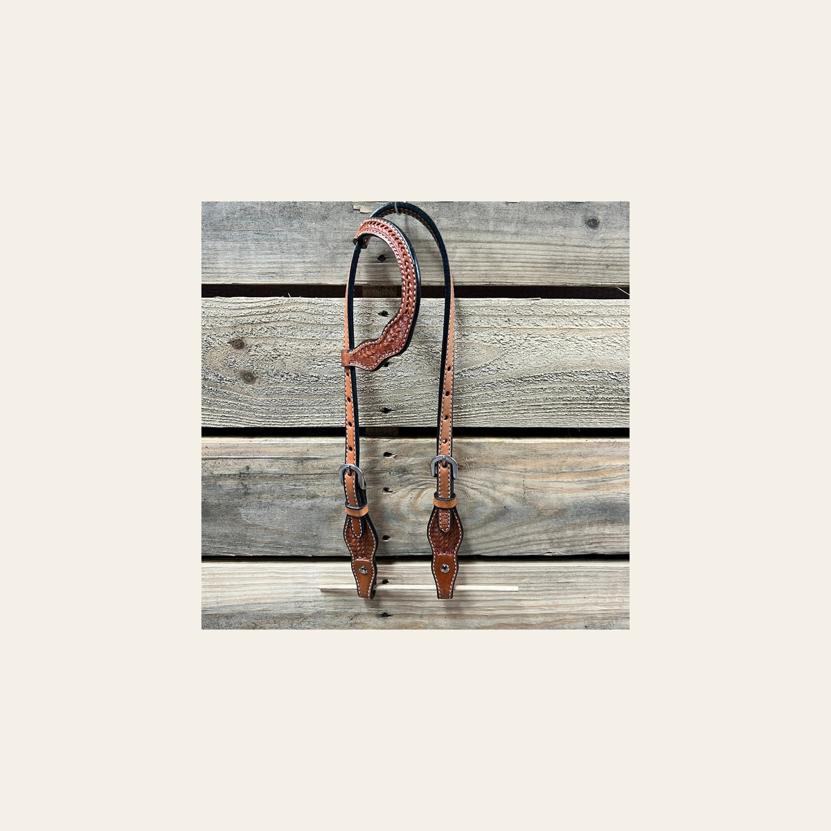 Light Oil Cob - Gag One Ear Headstall / Bridle- Short Cheeks on a warm cream background
