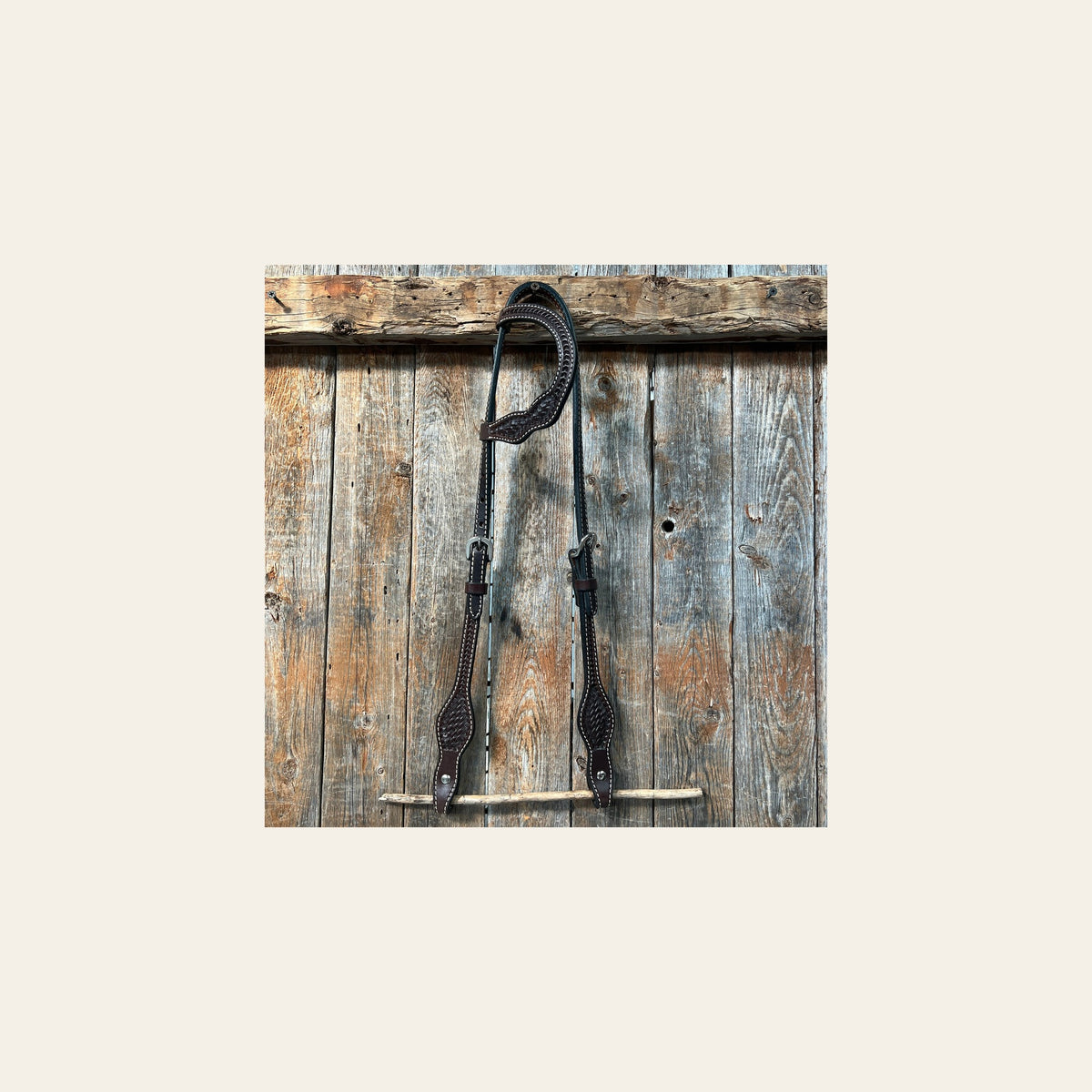 Basketweave Dark Oil One Ear Headstall / Bridle on a warm cream background