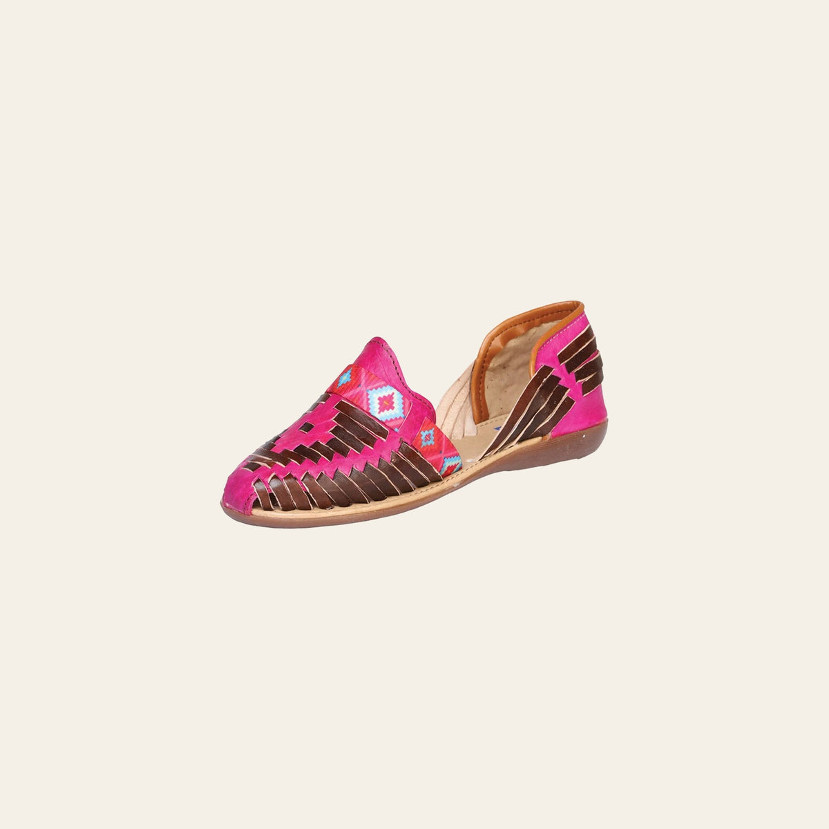Mexican Artisanal Sandals Leather Fuchsia/Brown 601943 on a warm cream background