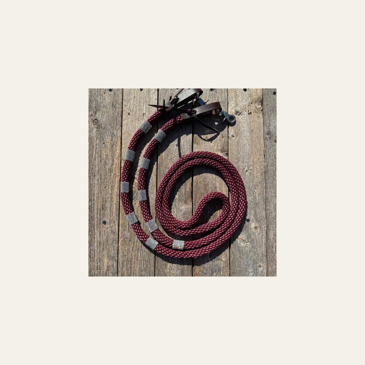 Burgundy Nylon Barrel Racing Reins with Rhinestones #BNR107 on a warm cream background