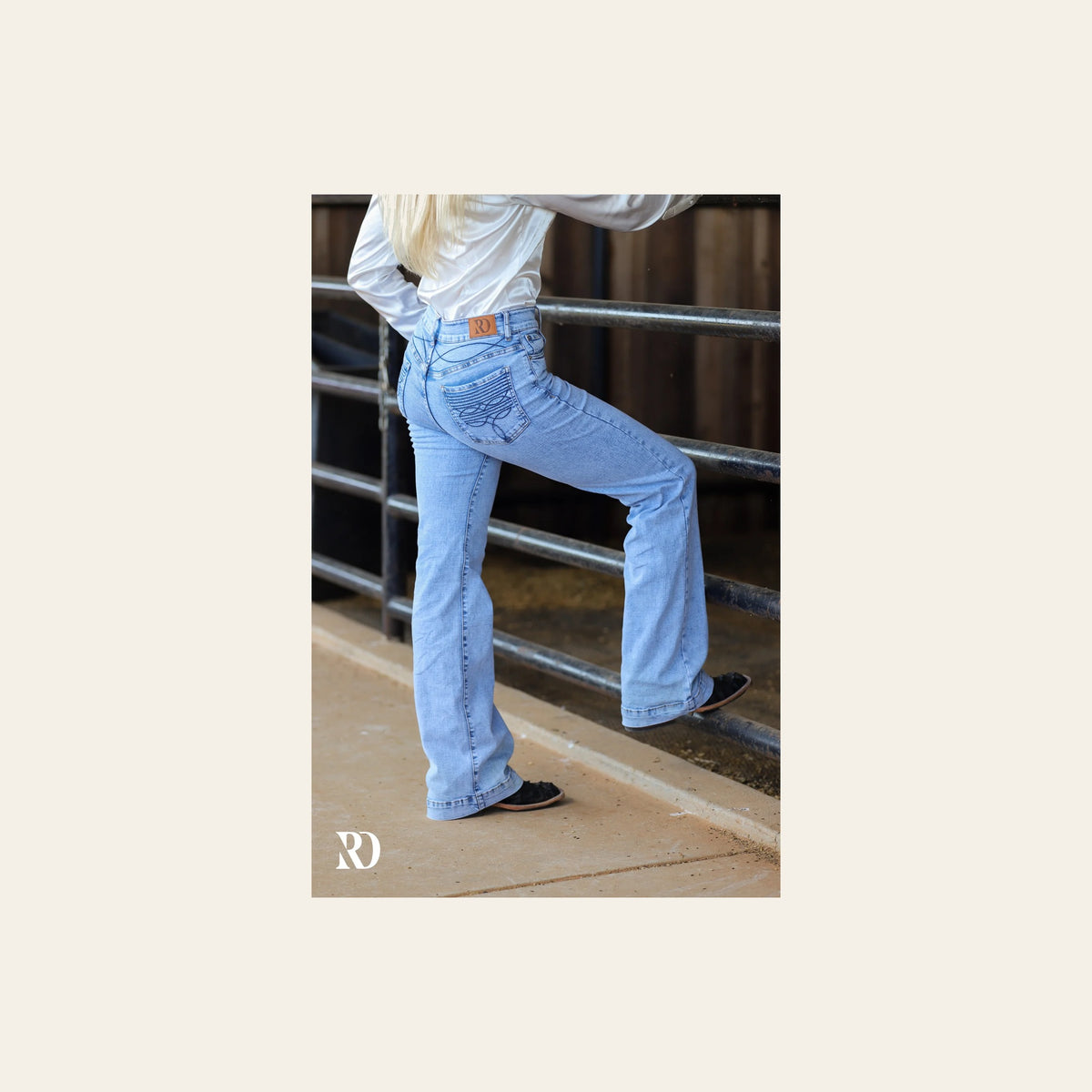 Cheyenne Trousers - Acid Wash on a warm cream background