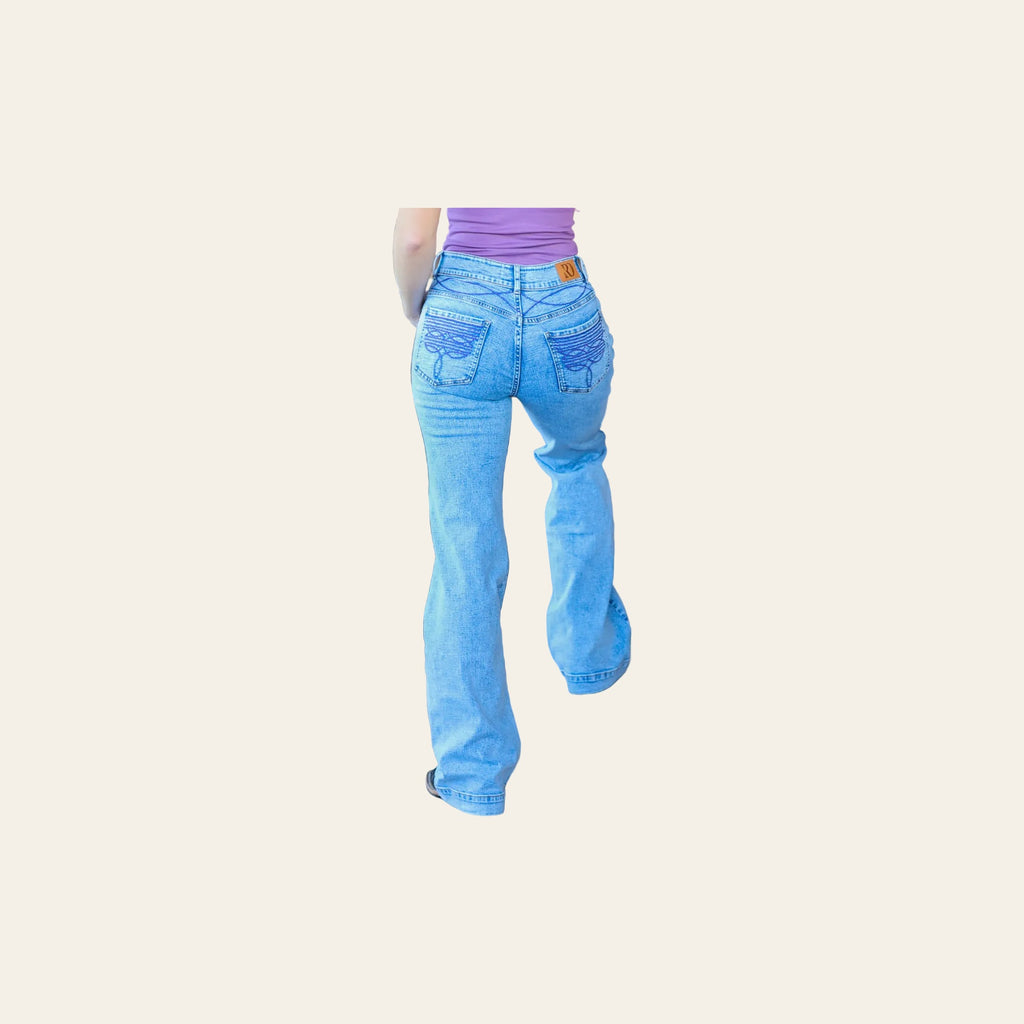Cheyenne Trousers Acid Wash Purple Pocket on a warm cream background