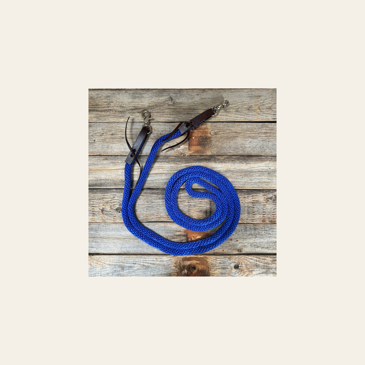 Cobalt Nylon Barrel Racing Reins #NR102 on a warm cream background