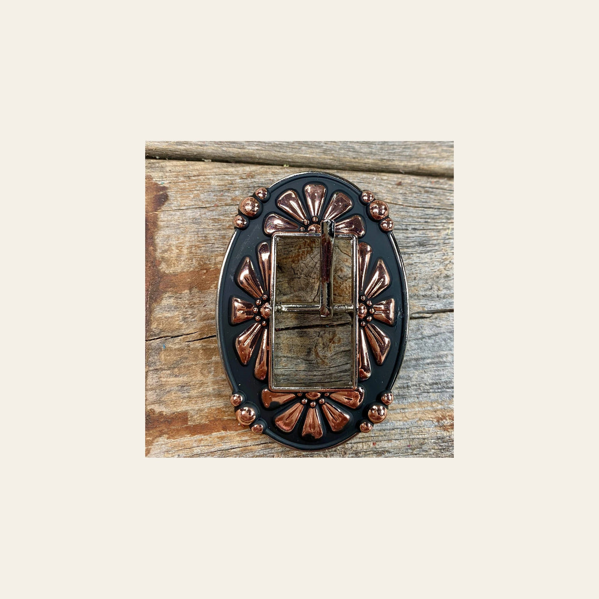 Copper Flower Buckle W196B on a warm cream background