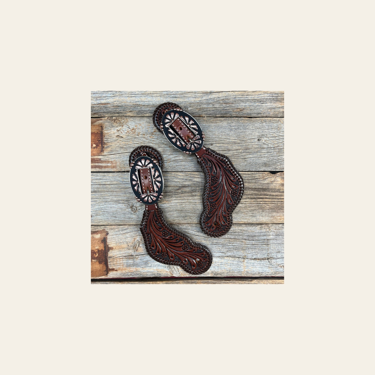 Dark Oil Whipstitch Copper Flower Spur Straps - Copper Flower #SS124 on a warm cream background