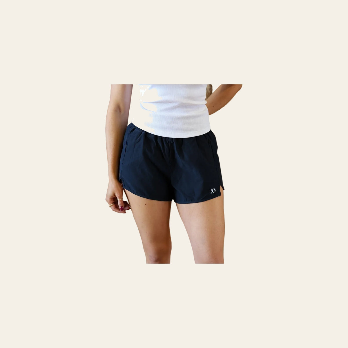 Essentials Shorts | Navy on a warm cream background