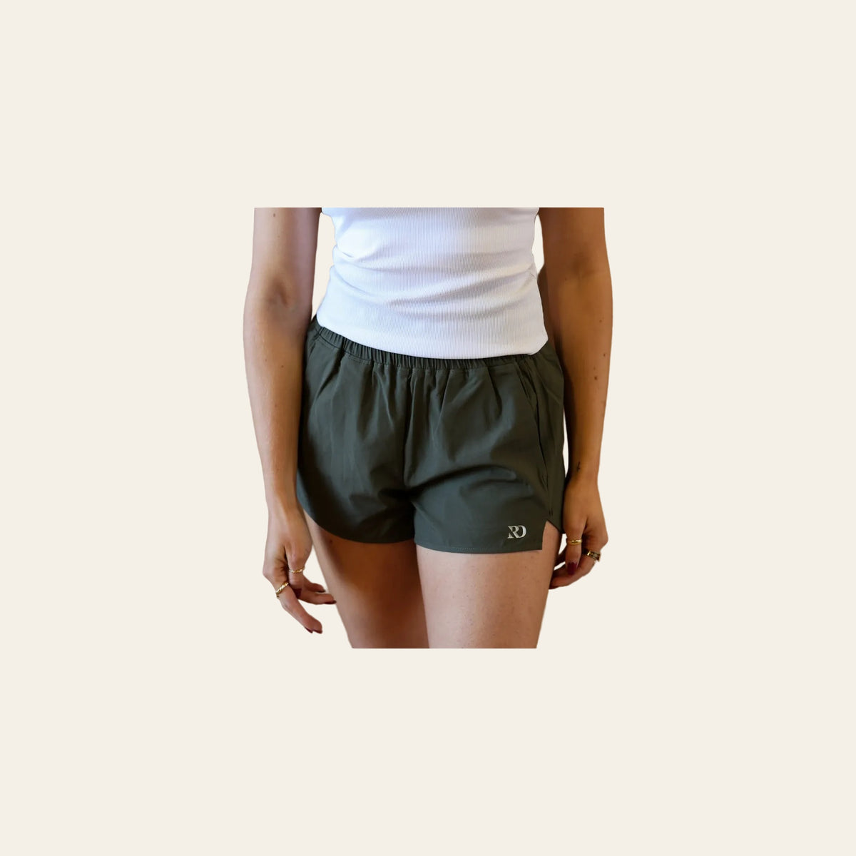 Essentials Shorts | Olive on a warm cream background