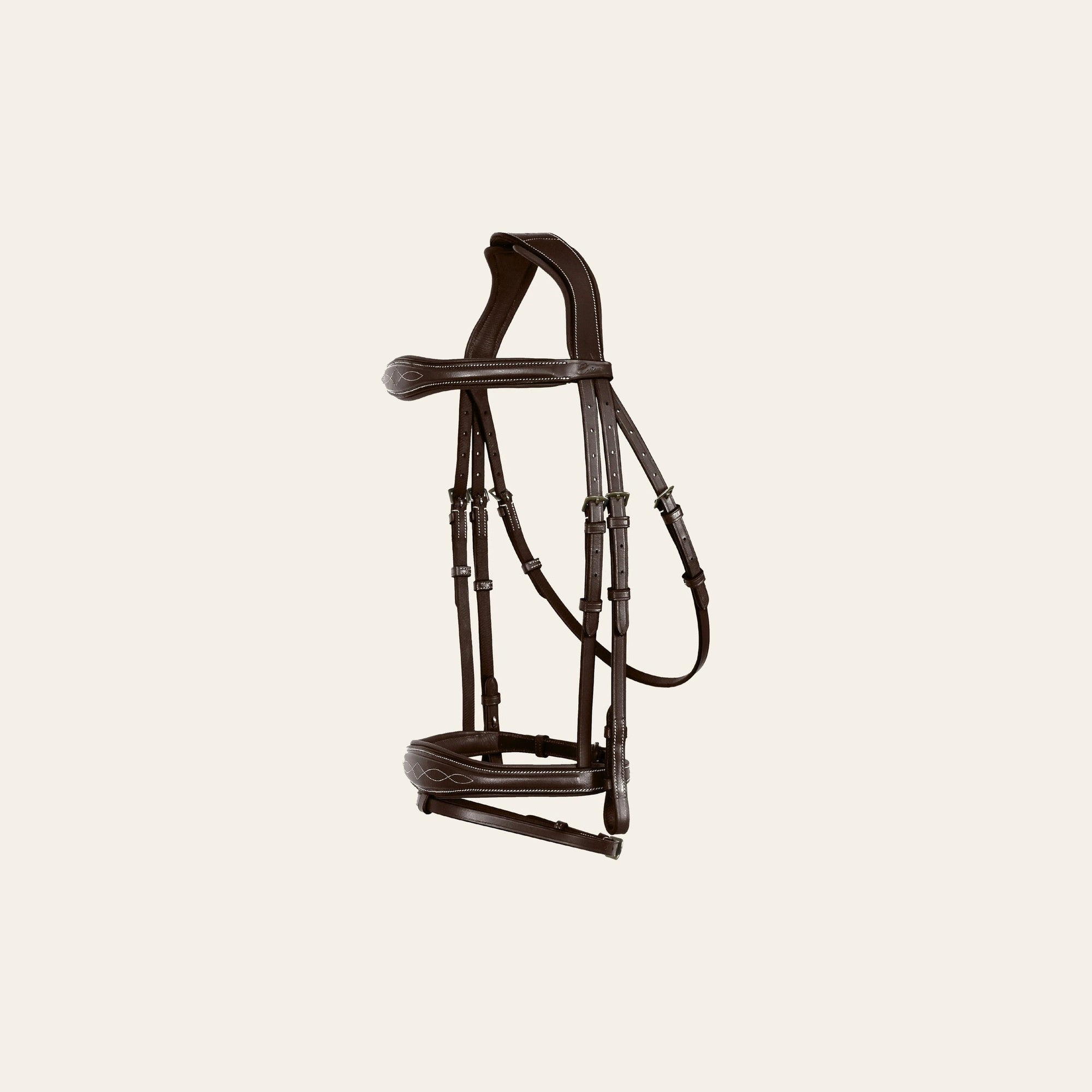 ExionPro 'Perseus' Anatomical Jumping Bridle with Reins on a warm cream background