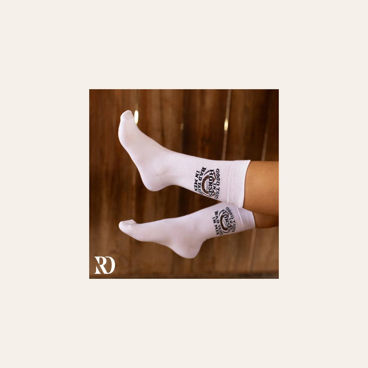 Good Taste In Horses Bad Taste In Men Socks on a warm cream background