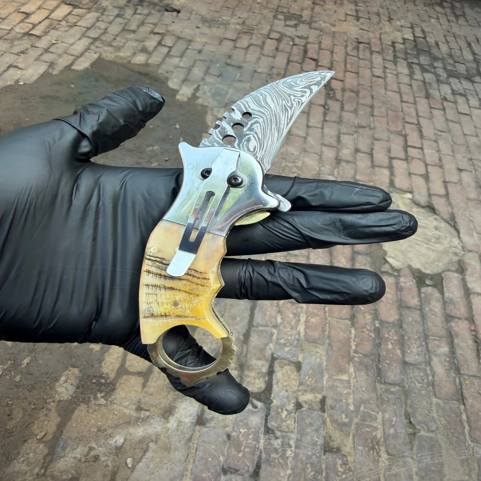 Wolf Claw Damascus Folding Karambit with Engraved Wolf Bolster