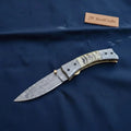 Swayback Damascus Folder with Damascus Bolster Caps