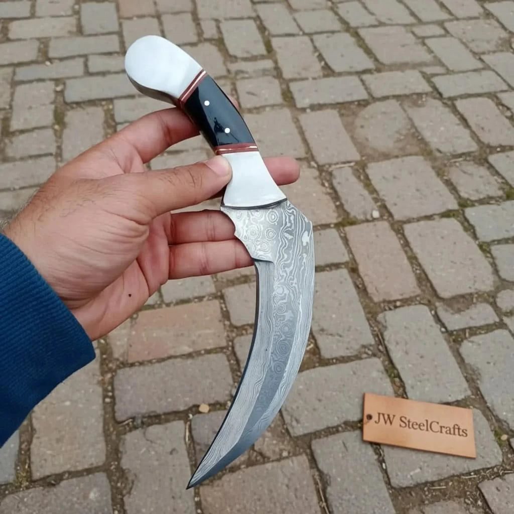 Karambit Knife with Black horn and Stainless steel handle.