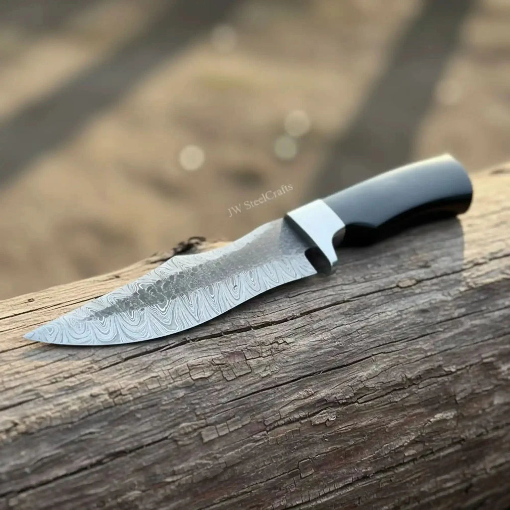 Damascus Trailing Point Fixed Blade Hunting Knife — Forged Ladder Pattern Blade, Black Resin Handle & Steel Guard