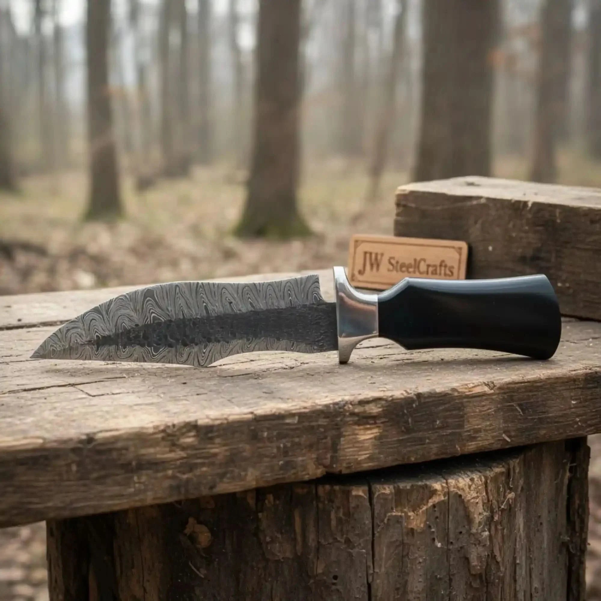 Damascus Trailing Point Fixed Blade Hunting Knife — Forged Ladder Pattern Blade, Black Resin Handle & Steel Guard